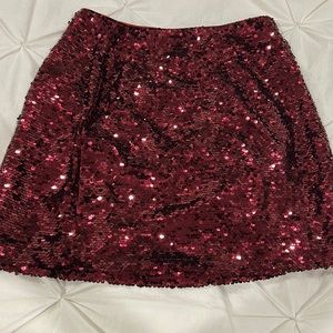 Burgundy sequence, almost new skirt